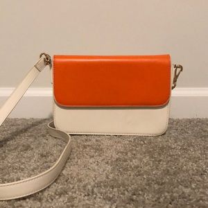 Two-toned orange and white cross body purse